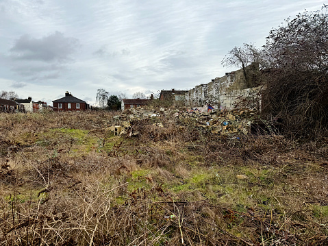 Rubble left on waste ground in an inner city
