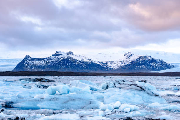 istock Glacier Lagoon Jokularlon with mountains and snow in the background 1985253949