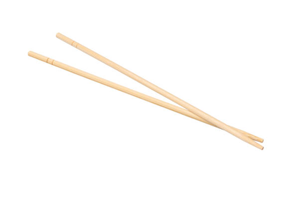 istock Sushi chopsticks isolated on a white background. 1985370961