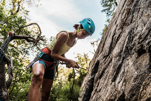 Woman sport climbing in Kalymnos island