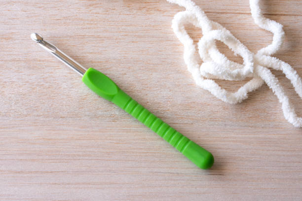 istock Green Crochet Hook and Yarn 1985384531