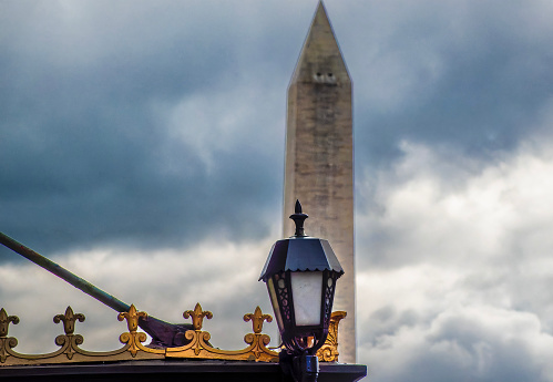 Light on the awning of a hotel near the Washington Monument in Washington DC