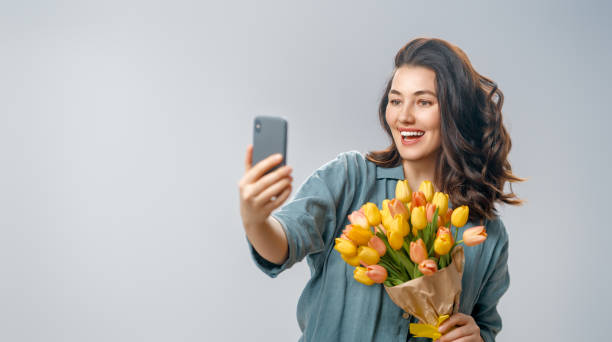 istock woman with flowers 1985461234