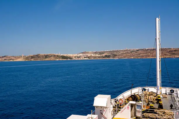 Mgarr and its port on the island of Gozo (Malta) and bow of the carferry