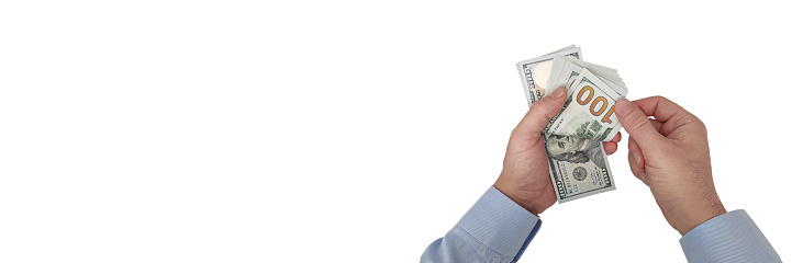 Businessman counting USA one hundred Dollar bills