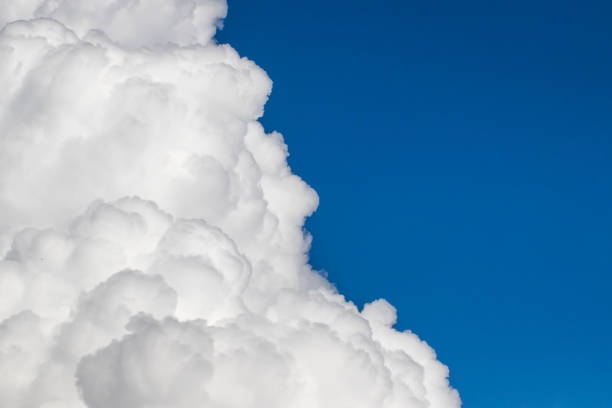 White clouds floating in a clear blue sky
