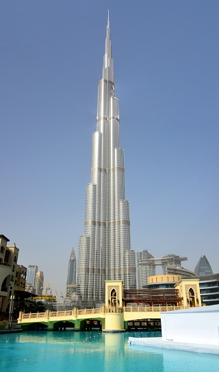 Dubai, United Arab Emirates: Bridge to Souk Al Bahar and Burj Khalifa, dwarfing the nearby skyscrapers - Hikma Tower, Address Sky View towers, Boulevard Plaza, Dubai Mall - Sheikh Mohammed bin Rashid Boulevard - Emaar Properties.