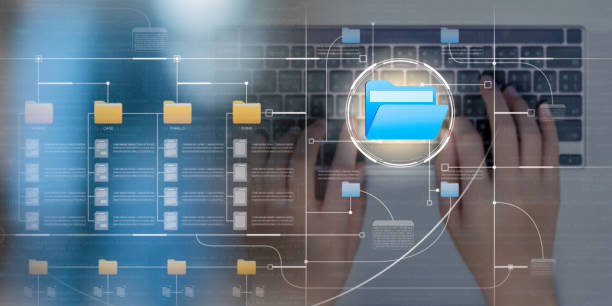 istock Businesswoman working on laptop with digital document, Security in accessing information, data search, cloud technology, Enterprise content management, Document management system and files data. 1985526868