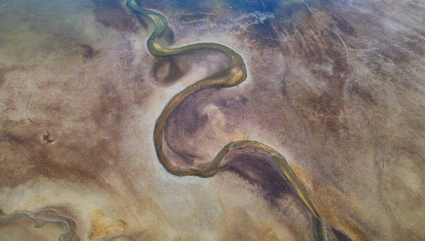 istock Muddy shore on the Pacific Ocean Shore. Aerial Nature Background 1985528949