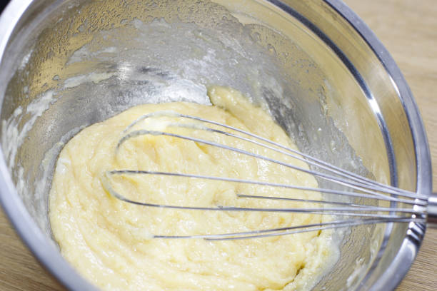 istock cake batter in a deep bowl and blender 1985613819
