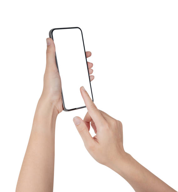 istock Hand holding smartphone with blank screen isolated on white background. 1985621752