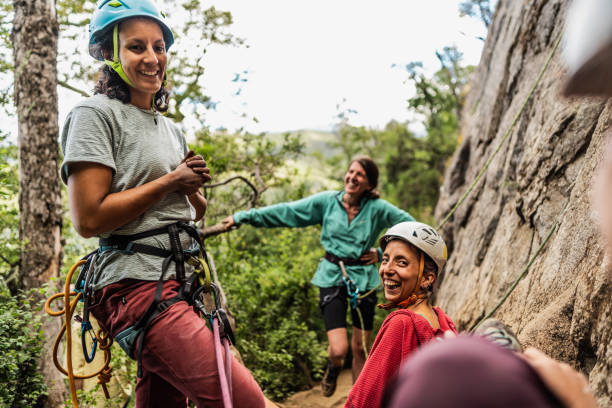 istock Climber friends having fun during climbing outdoors 1985634075