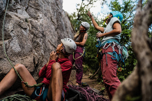 istock Climber friends preparing for climbing outdoors 1985634076