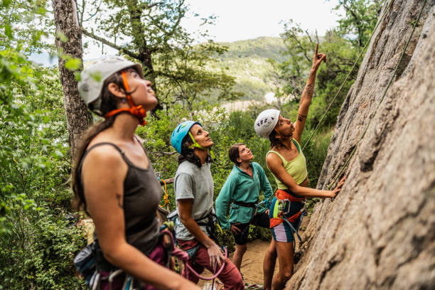 Climbers observing the mountain before starting the climb