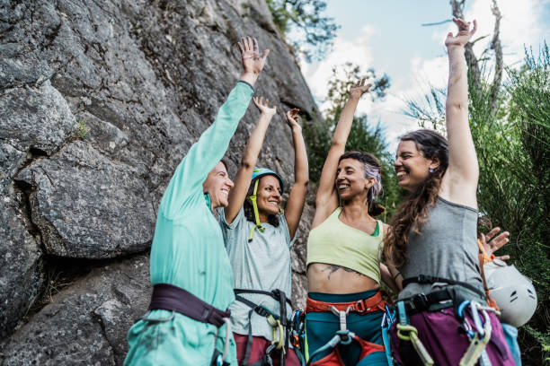 istock Climber friends celebrating outdoors 1985649503