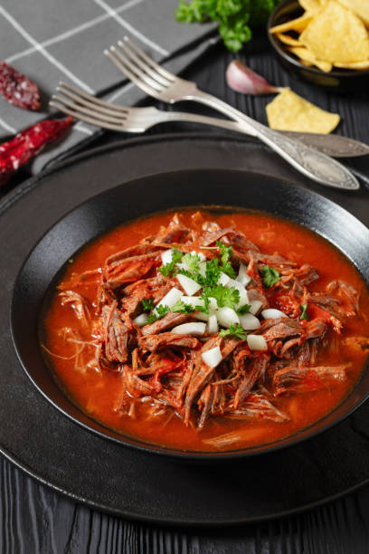 istock birria de res, mexican beef stew in pepper sauce 1985666760