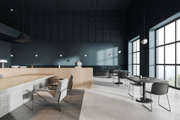 istock Modern dark restaurant interior with meeting and eating zone, panoramic window 1985679307