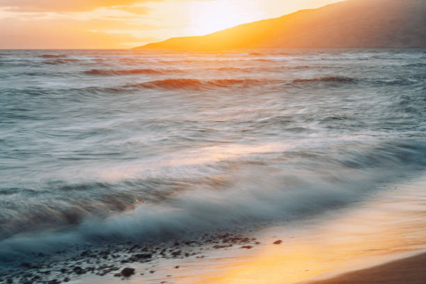 Clouds, sea, ocean, sand, water.