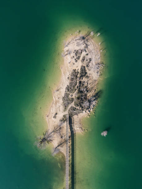 istock Lake island with bridge 1985707915