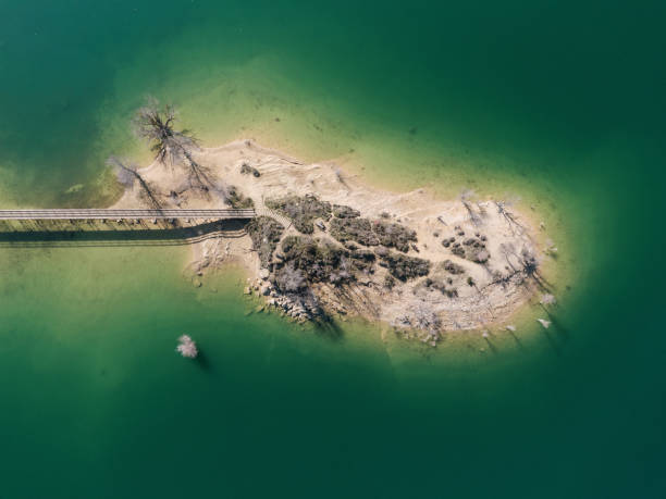 istock Lake island with bridge 1985708972