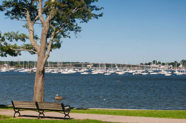 istock Park Bench and harbor view salem massachusetts 1985737631