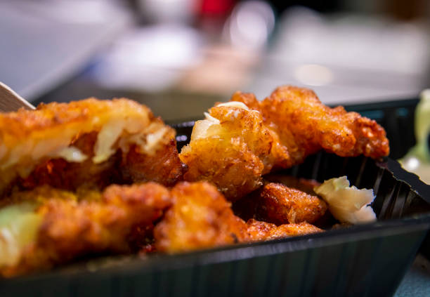 Closeup of popular Netherland fried fish snack  in a box.