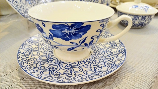 Traditional Chinese restaurant tableware: cups and plates.