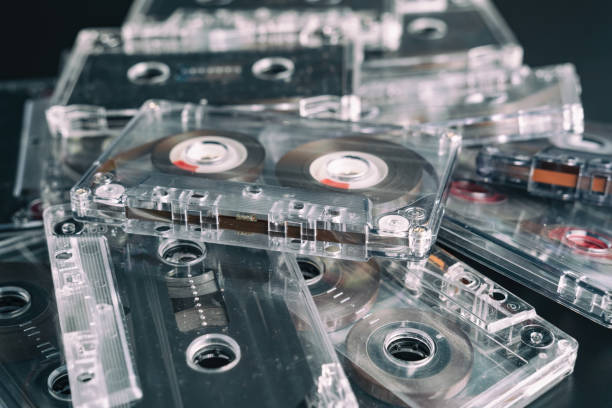 istock A stack of audio tape cassettes on black background. 1985791260