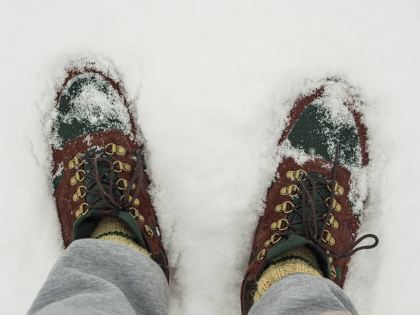 boots in the snow top view