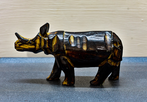One horn rhino made up of wood.