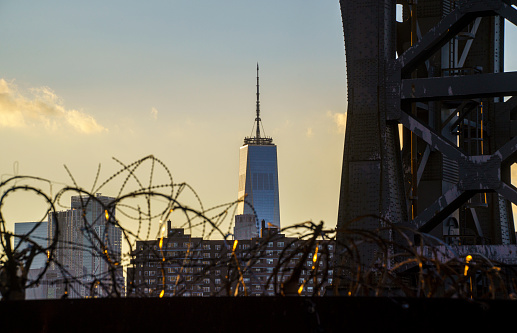 One World Trade Center seen under Williamsburg Bridge Brooklyn NY