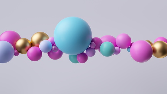 3d rendering, abstract modern wallpaper. Row of pink blue and gold plastic balls. Multicolored particles