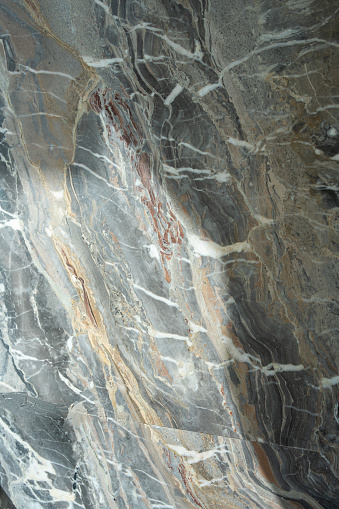 Texture of natural stone with original and abstract pattern for stylish decoration. Cool and solid surface giving sense of grounding and connection to earth. High quality photo