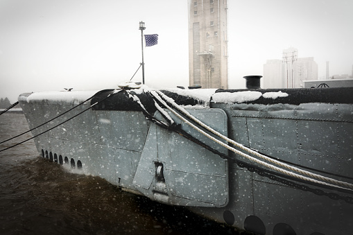 Manitowoc, Wisconsin, USA - January 12, 2024: The USS Cobia (SS245), during a snowstorm, and part of the Wisconsin Maritime Museum.