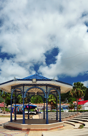 Marigot, Collectivity of Saint Martin / Collectivité de Saint-Martin, French Caribbean: elegant octagonal gazebo / bandstand with a dedicated amphitheater at Place du Marché - eaves with traditional Caribbean fretwork.