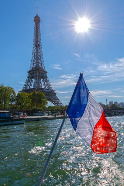 istock Eiffel Tower, Seine river and French flag 1985997935
