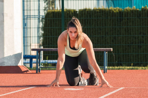 istock Woman start sprinting, training for an overweight client 1986037169