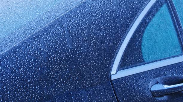 istock Frozen Dew Drops on Metal Car Chassis On Cold Winter Morning 1986043511