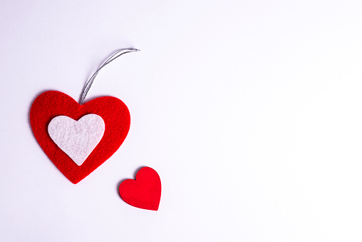 Two hearts with red background for Valentine's Day