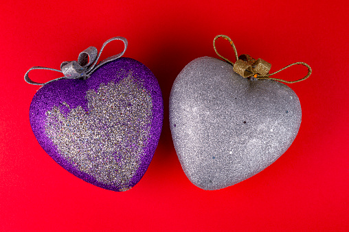 Two hearts with red background for Valentine's Day