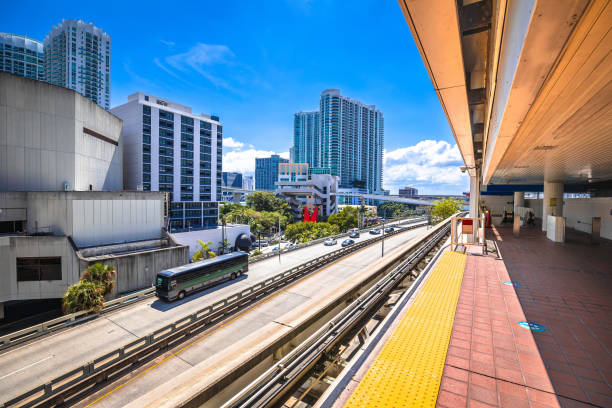 istock Miami downtown skyline and futuristic mover train track view, Florida 1986079883