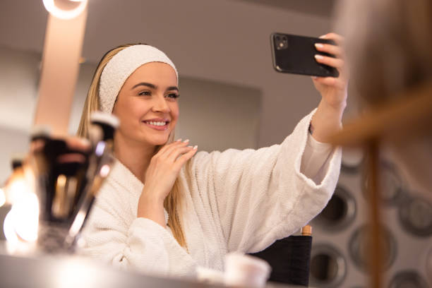 istock Radiant Selfie: Makeup Artist's Sweet Smile Shines Bright 1986100301