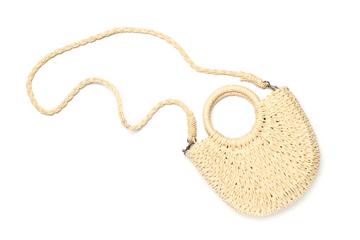 Straw bag isolated on white, top view