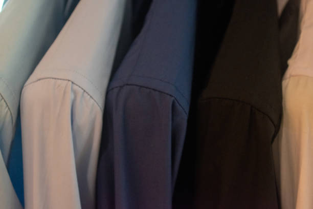 istock shirts on hangers in a clothing store 1986128307