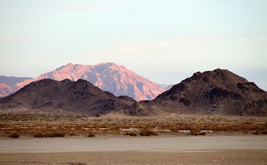 Image of the California desert near the Interstate 15 freeway at twilight on a winter day.