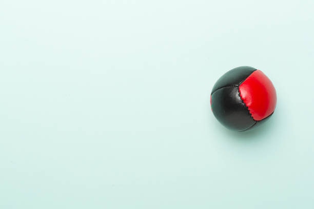 istock Colorful juggling ball on color background, top view 1986219916