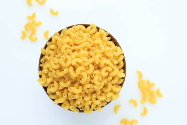 istock Top View Raw Dried Macaroni Pasta in A Bowl 1986312581