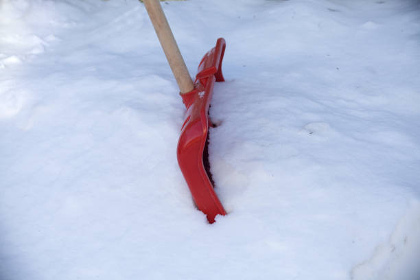 istock Snow shovel in winter. Footpath Snow clearing 1986405840