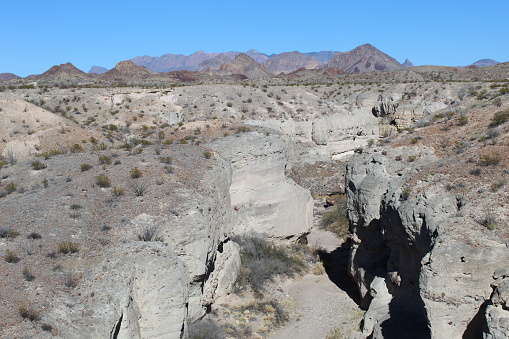 Canyon in Big Bend National Park with mountains in background.