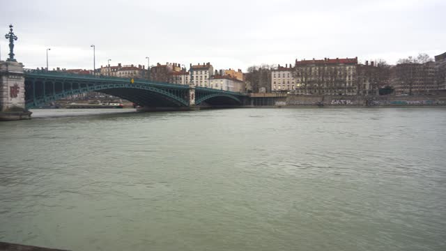 Scenic Panorama of Lyon's River Banks Connected by Historic Iron Bridges Over the Tranquil Rhone River, France